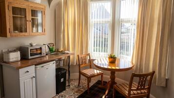 Fridge, microwave, toaster, cookware/dishes/utensils