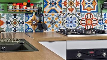 Family Villa, Balcony | Private kitchen | Fridge, microwave, oven, stovetop