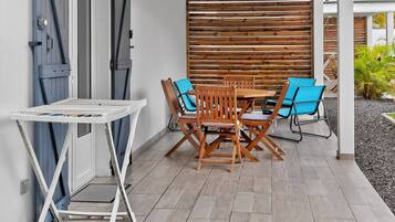 Family Bungalow, Balcony | Outdoor dining