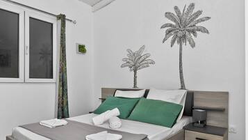 Family Bungalow, Balcony | Laptop workspace, iron/ironing board, free WiFi, bed sheets