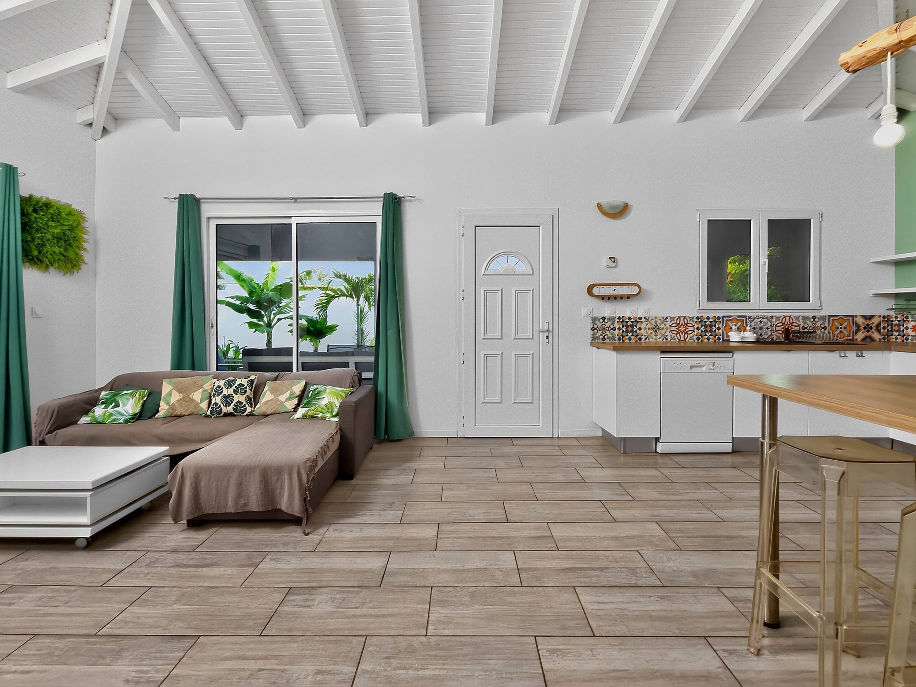 Family Villa, Balcony | Living area | 55-inch LED TV with cable channels