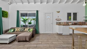 Family Villa, Balcony | Living area | 55-inch LED TV with cable channels