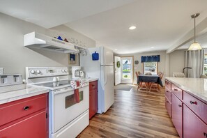 Fridge, microwave, oven, stovetop - Triboji Beach Club Cottage | Cozy West Okoboji Escape with Lake Access (Spirit Lake)