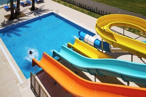 A swimming pool with multiple water slides. - Palm Beach Skanes (Monastir)