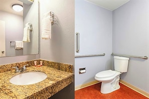 A bathroom with a granite sink, white toilet, and handrails. - OYO Hotel Irving DFW Airport South (Irving)