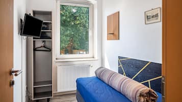 3 habitaciones, tabla de planchar con plancha, wifi y ropa de cama