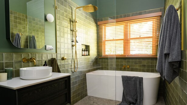 A bathroom with a bathtub, a sink, a shower, and a window. - Higgins House - Hepburn Springs (Hepburn Springs)