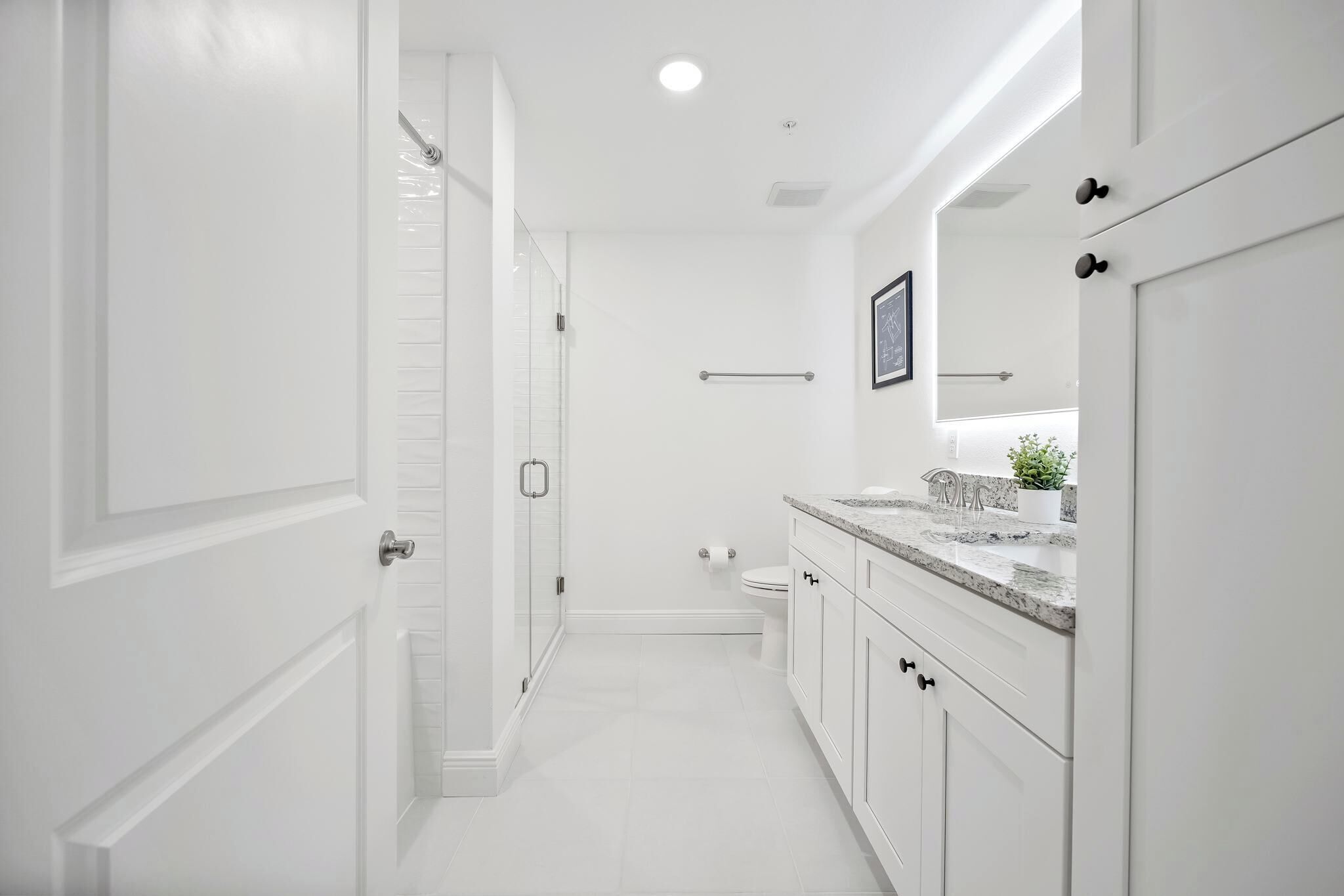 Shower, hair dryer, towels, shampoo
