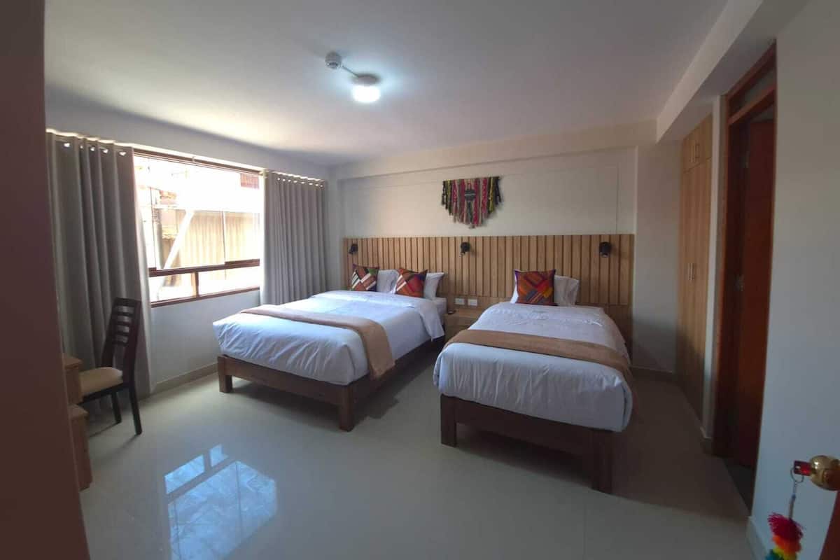 Kamar Triple Deluks | Meja kerja, ruang kerja ramah laptop, dan Wi-Fi gratis