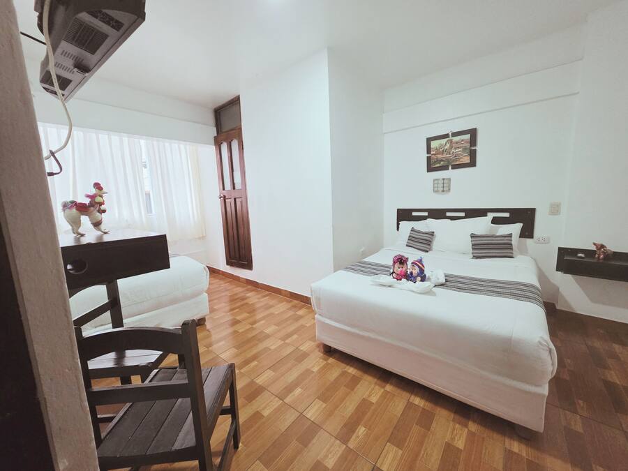Quarto família | Escrivaninha, espaço de trabalho para notebook, Wi-Fi de cortesia