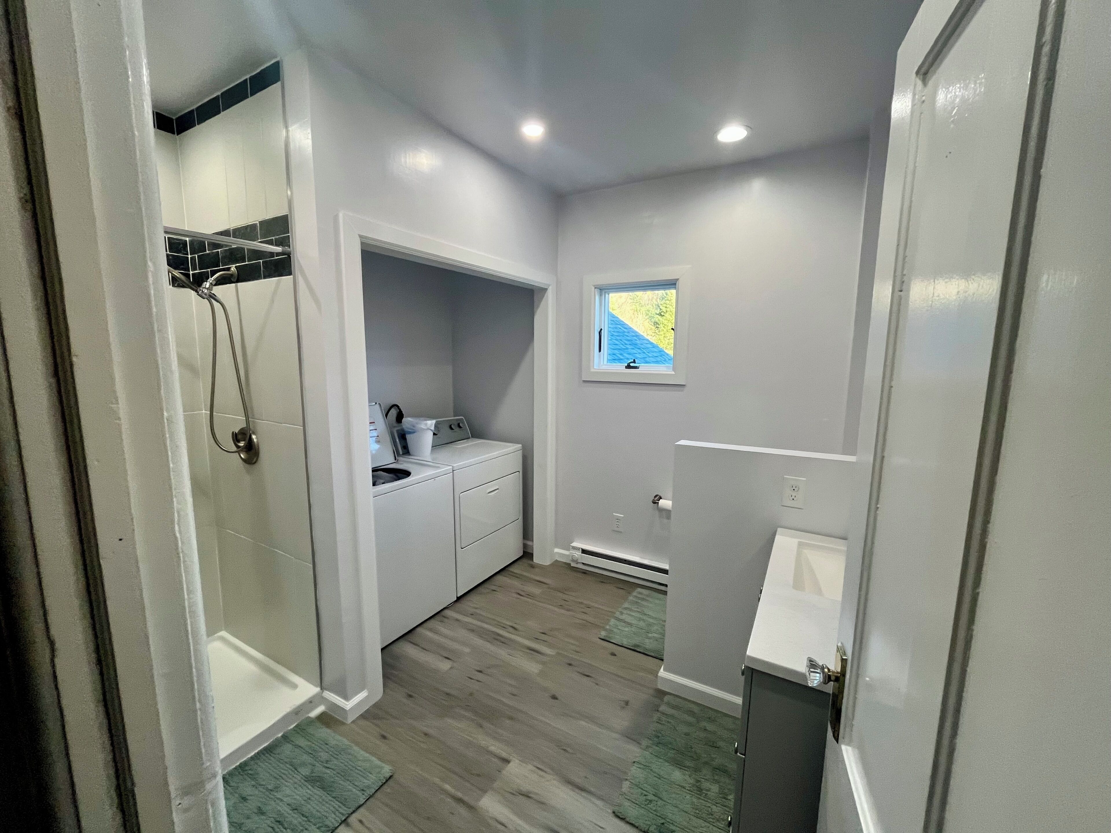 Shower, towels, soap, toilet paper