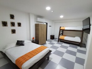 Deluxe Quadruple Room, Patio | In-room safe, soundproofing, iron/ironing board, free WiFi - Hotel Boutique El Olimpo S.A.S (Santa Marta)