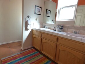 Shower, hair dryer, towels, toilet paper