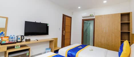 Standard Double or Twin Room | In-room safe, desk, laptop workspace, blackout drapes