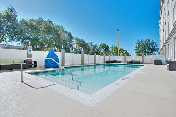 Stretch out poolside and soak up the open-sky calm.