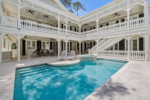 Outdoor pool, a heated pool - Luxury 2nd Row Beach Estate l 6BR l Private Courtyard Pool & Spa l Sleeps 12 (Hilton Head Island)