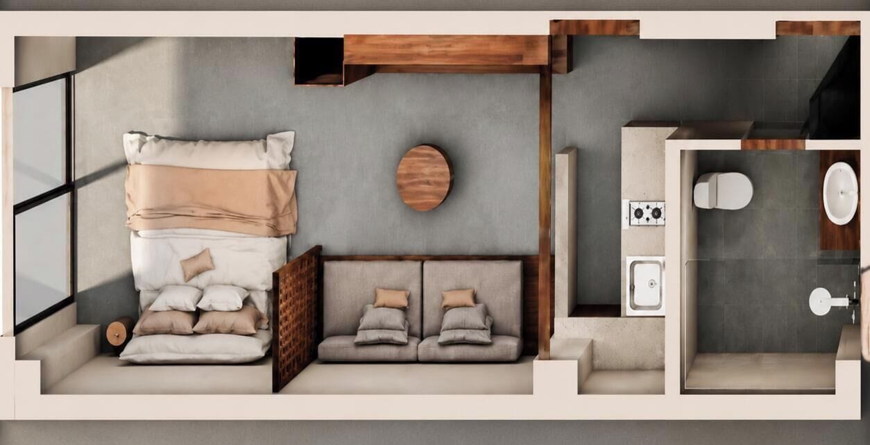A modern hotel room with a bed, a sofa, a round wooden accent, a bathroom with a toilet, sink, and shower.