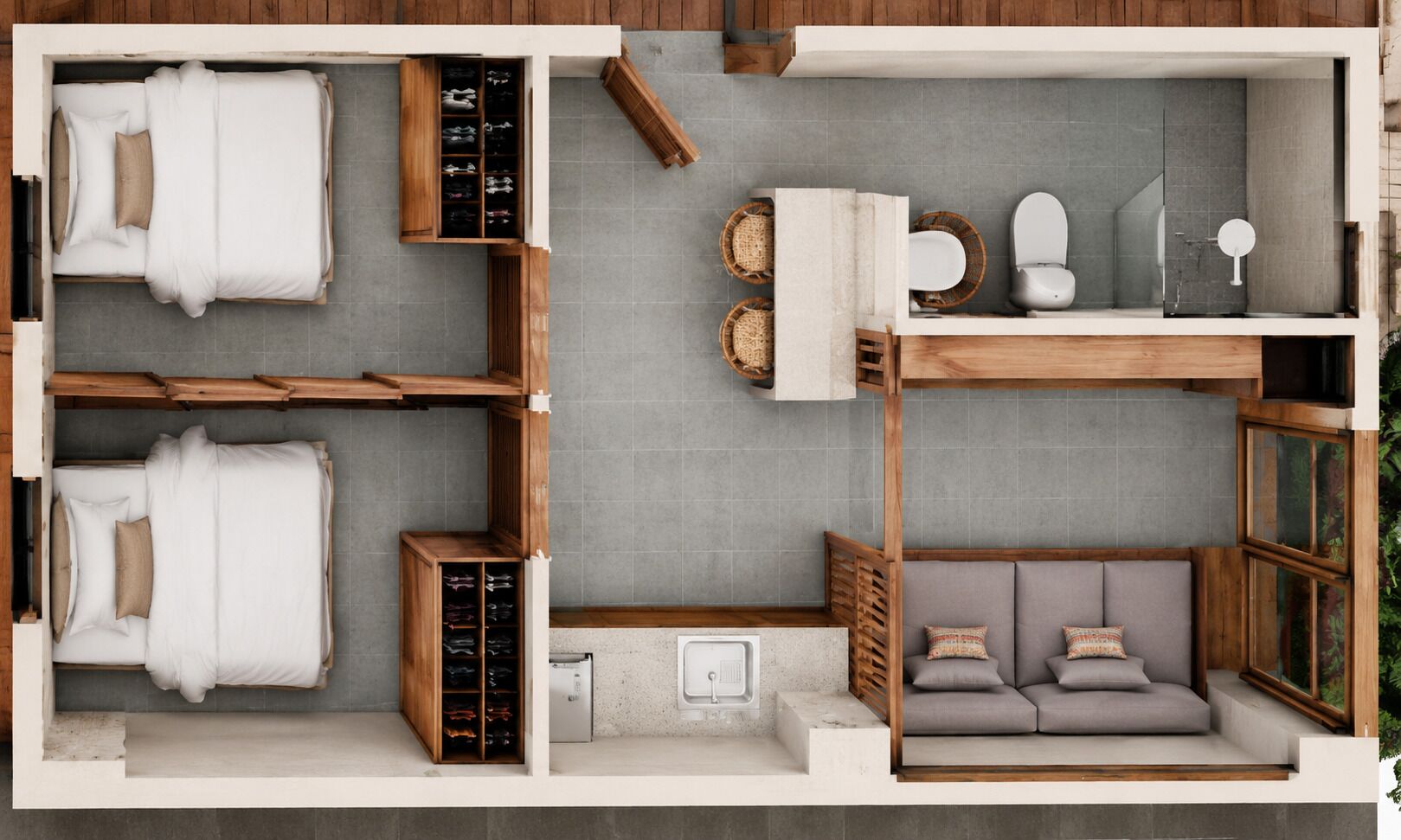 Ein Hotelzimmer mit zwei Betten, einer Couch, einer kleinen Küchenzeile und einem Badezimmer.