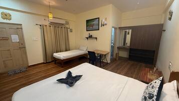 Deluxe Room, Air conditioning | Desk, laptop workspace, free WiFi