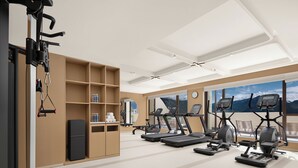 Uma academia moderna com esteiras, uma bicicleta ergométrica e um espelho.