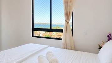 Premium Apartment, Jetted Tub, Beach View | Premium bedding, individually decorated, individually furnished