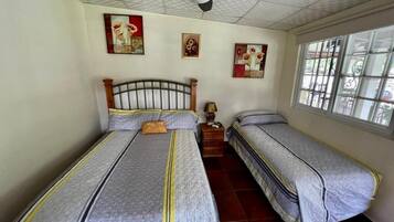 Triple Room, Patio, Courtyard View | Individually decorated, individually furnished, blackout curtains