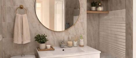 Shower, hair dryer, bidet, towels