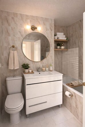Douche, sèche-cheveux, bidet, serviettes fournies