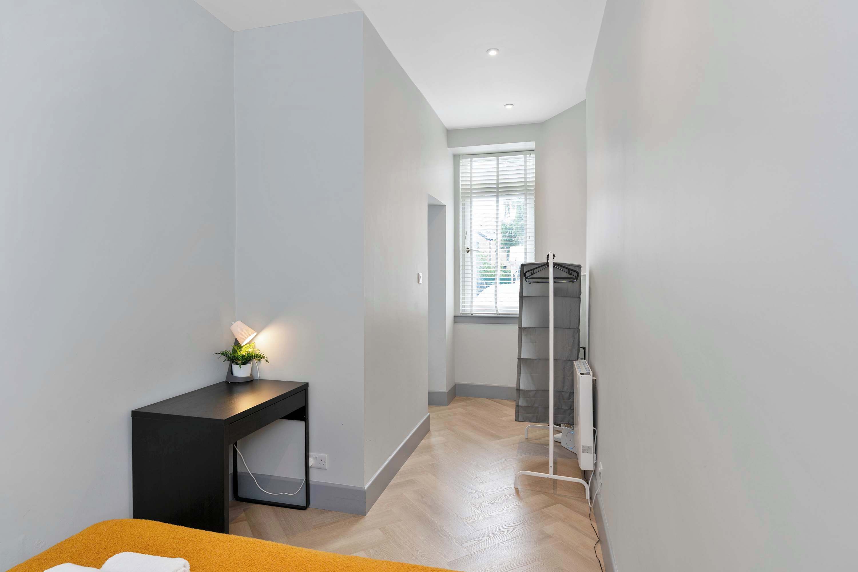 1 bedroom, desk, iron/ironing board, travel crib