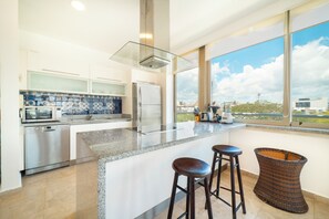 Standard Condo, Balcony, City View | Private kitchen - 2 Br condo with Rooftop Pool - Doca 303 (Playa del Carmen)