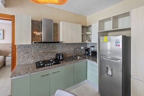 Private kitchen - Lujoso Apartamento de 2Hab a solo 5 Minutos de la Playa Dominicus Bayahibe (Dominicus)