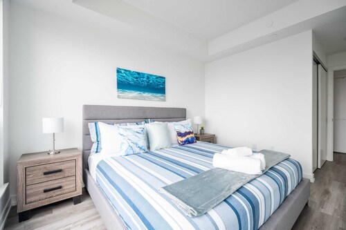 High Rise 1BR Condo w Balcony & Beautiful Views