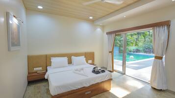 Deluxe Room, Balcony, Pool View | Laptop workspace, free WiFi