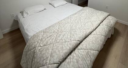 Cozy 1 bedroom basement suite with private entrance from the side of the house