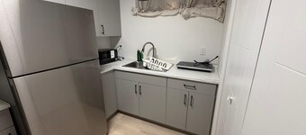 Cozy 1 bedroom basement suite with private entrance from the side of the house