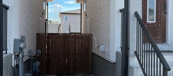 Cozy 1 bedroom basement suite with private entrance from the side of the house