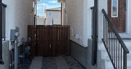 Cozy 1 bedroom basement suite with private entrance from the side of the house
