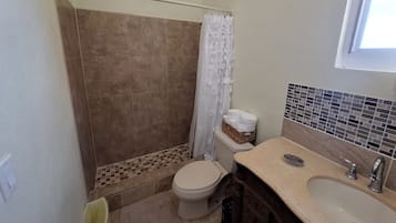Hair dryer, towels, soap, toilet paper