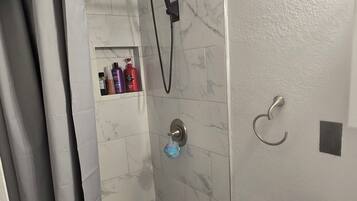 Hair dryer, towels, soap, toilet paper