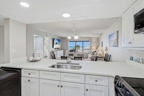 Fridge, microwave, oven, stovetop - Reef Club 302 Gulf View Condo w/ Pool, Beach Access, Tennis & Sunsets (Indian Rocks Beach)