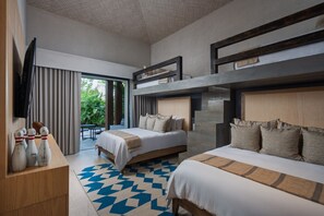 A modern hotel room with two beds, a television, a desk, and a view of greenery outside. - Casa De Elementos in Punta Mita (Punta de Mita)