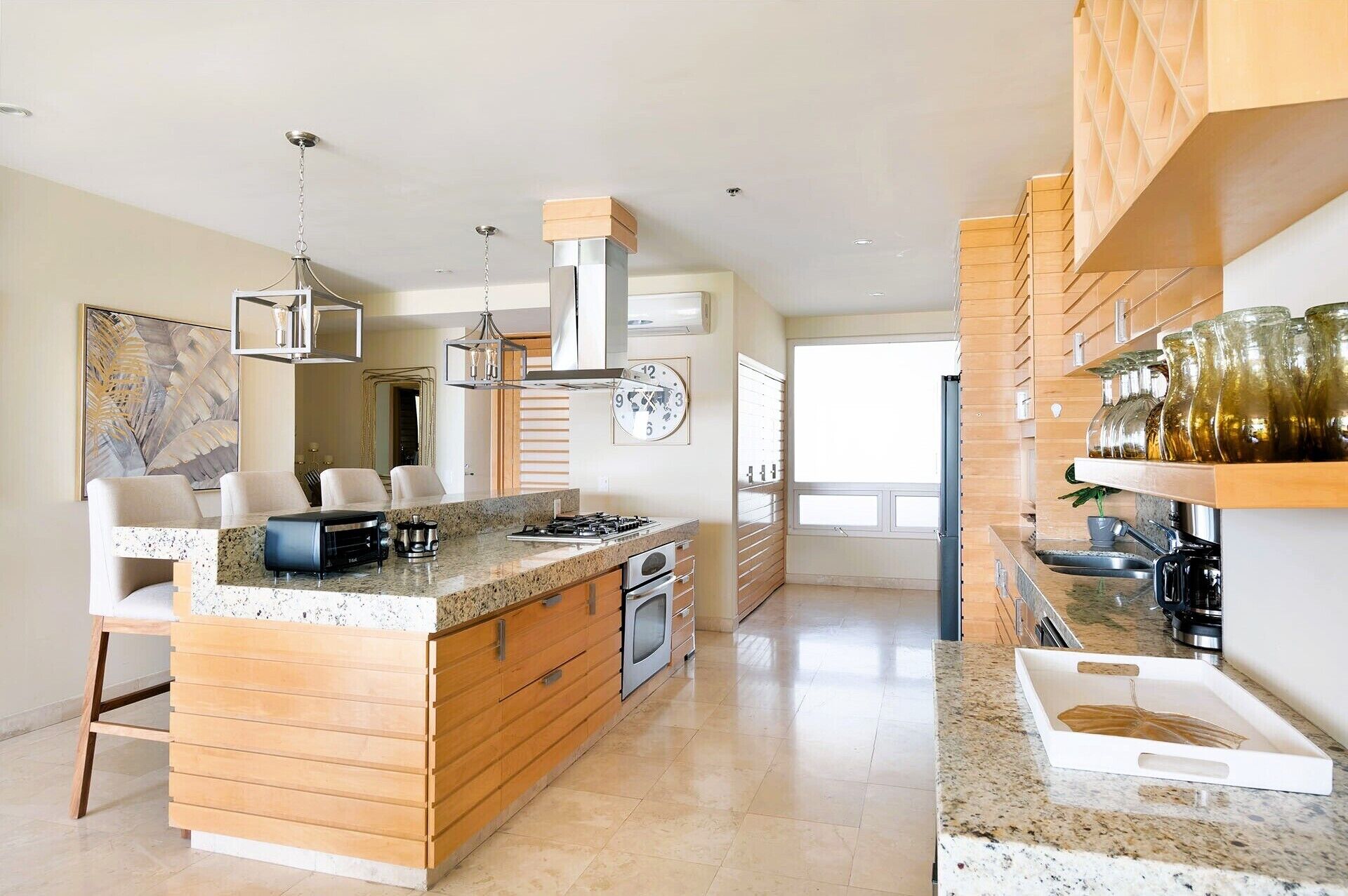 Departamento Deluxe, patio, vista al lago | Cocineta privada | Refrigerador, microondas, horno y parrilla de estufa 
