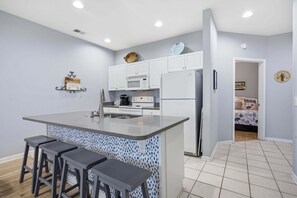 Fridge, microwave, oven, stovetop - SB03 Sunset Par-adise - Community Pool, Elevator (Sunset Beach)