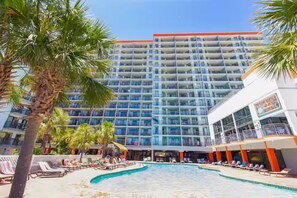 A hotel with a large pool, multiple floors, and a modern design. - Luxury Oceanview Studio • Ground Floor Access (Myrtle Beach)
