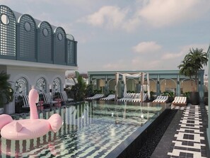 Kolam renang outdoor, dengan payung kolam renang dan kursi berjemur