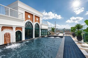 Outdoor pool, open 8:00 AM to 10:00 PM, pool umbrellas, sun loungers
