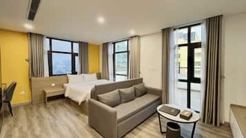 Premier Apartment, Balcony, City View | In-room safe, desk, laptop workspace, blackout curtains