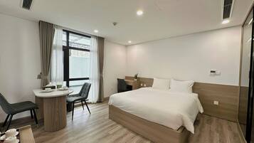 Deluxe Apartment, Non Smoking, City View | In-room safe, desk, laptop workspace, blackout curtains