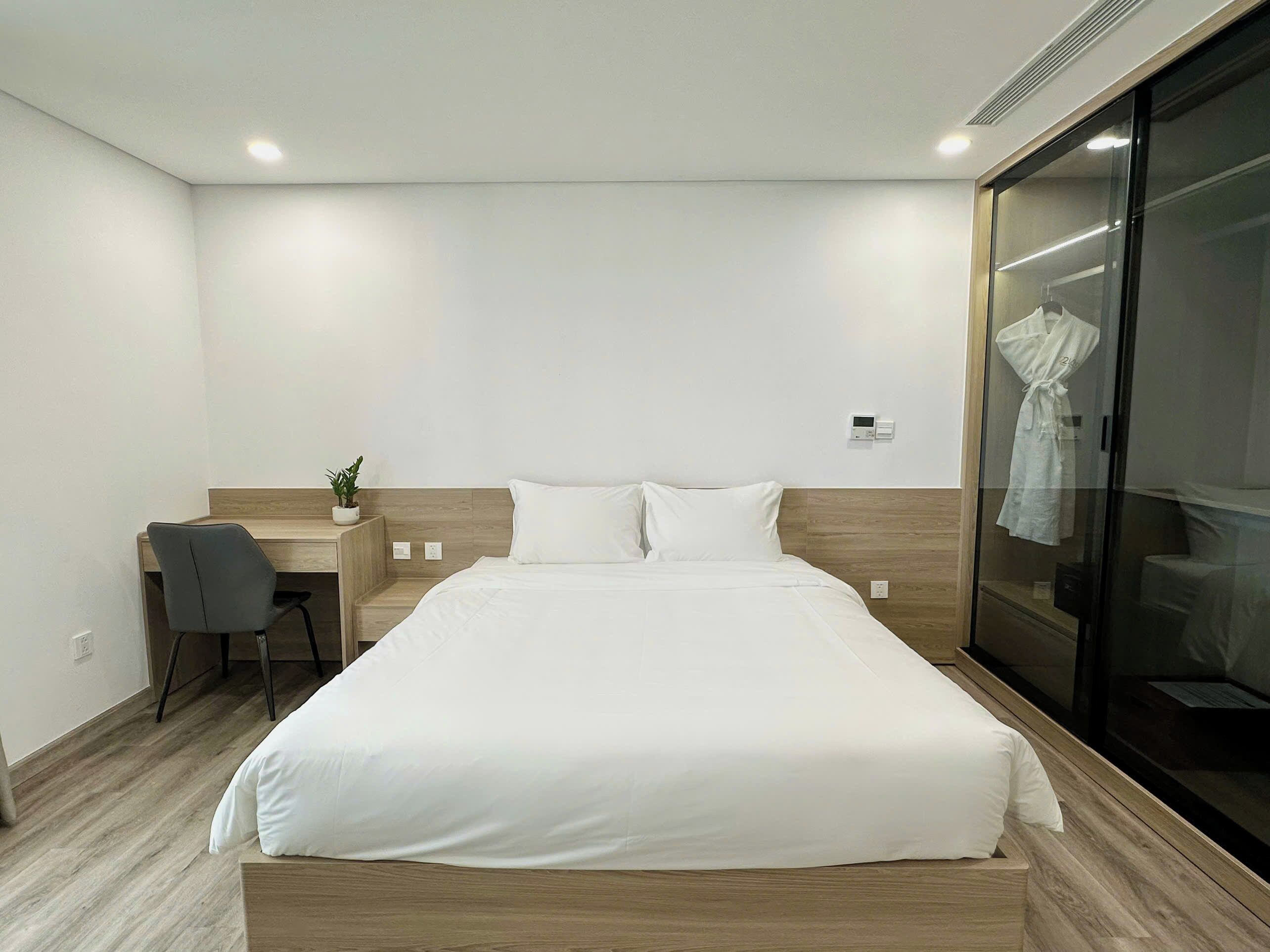 Appartement Deluxe, non-fumeurs, vue ville | Coffres-forts dans les chambres, bureau