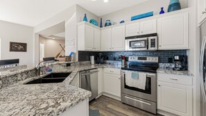 Fridge, microwave, oven, stovetop - Lakefront Updated Condo at 2mm w/ 2 Pools, Hot Tub, Boat Slip (Lake Ozark)